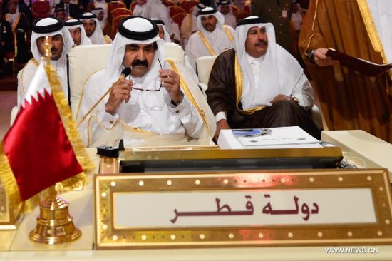 El emir de Catar, Hamad bin Khalifa al-Thani, durante la cumbre celebrada en su país.